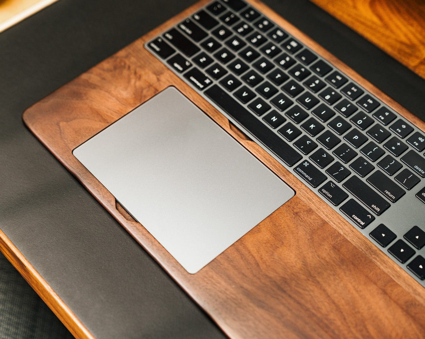 The Pro Magic Walnut Keyboard and Trackpad Tray
