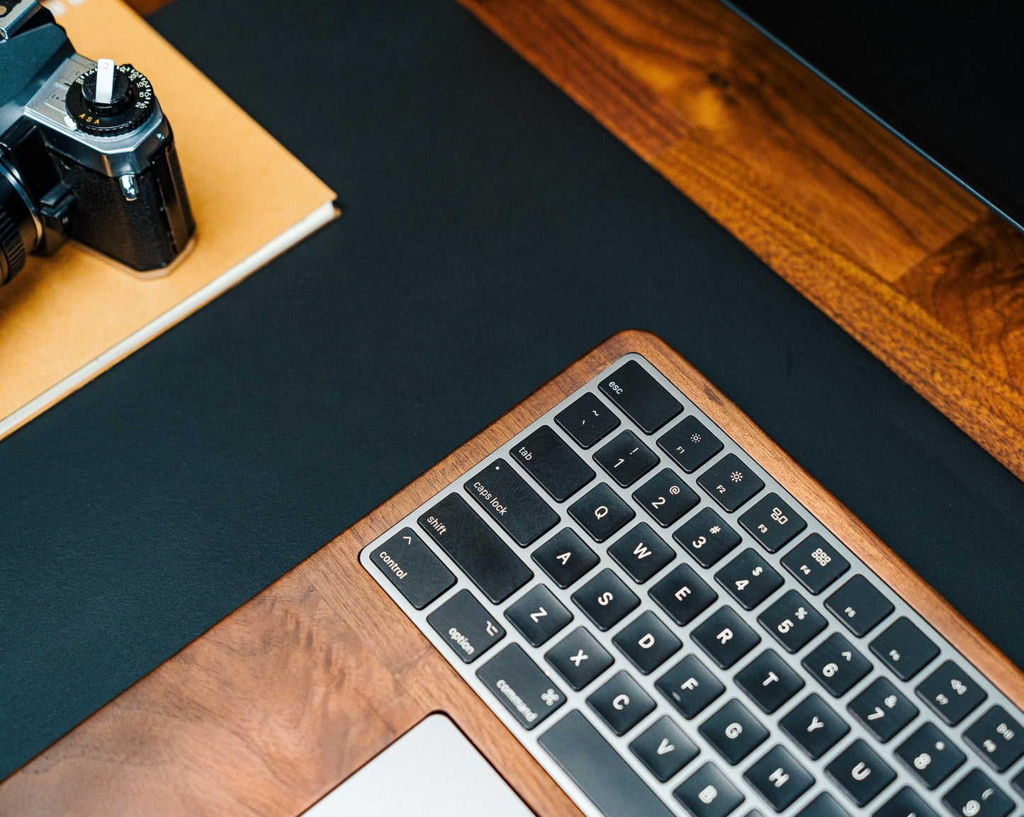 The Pro Magic Walnut Keyboard and Trackpad Tray