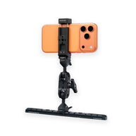 Phone clamp holding a smartphone, attached to a NATO rail base