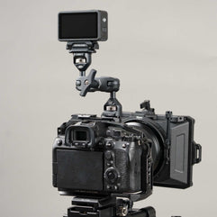1/4-20 articulating arm mounted on camera supporting accessory