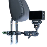 Headrest mount holding a DJI camera beside a car headrest