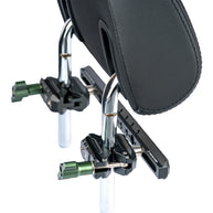 Headrest rail kit clamps mounted on headrest posts, viewed from behind the seat