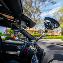 12 inch arm suction-mounted to a windshield, holding a camera inside a car