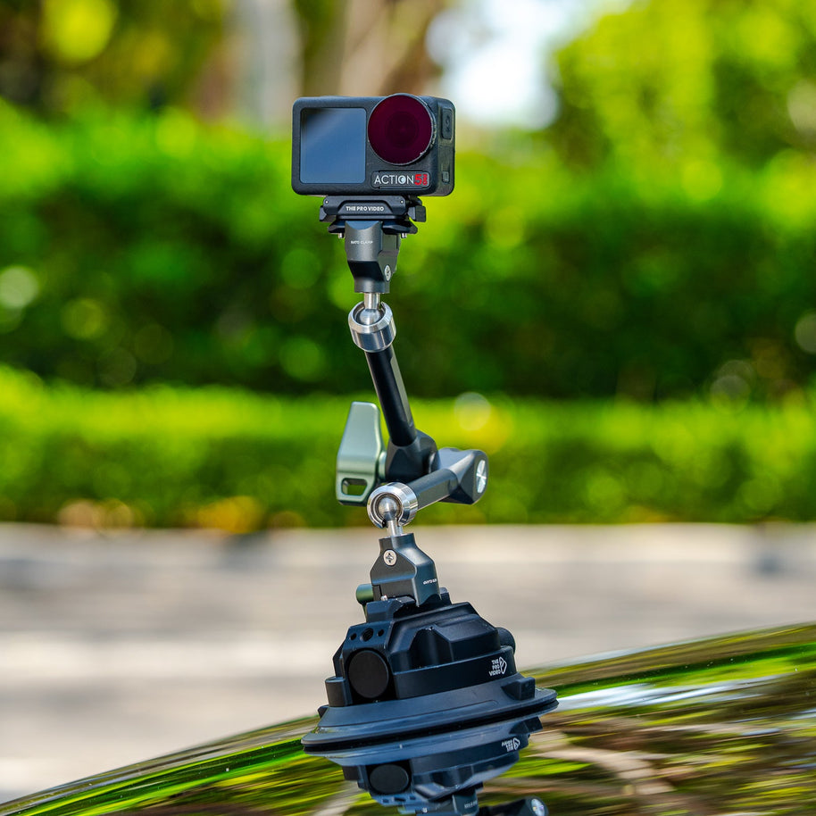 12 inch articulating arm holding a DJI action camera on a car hood suction mount