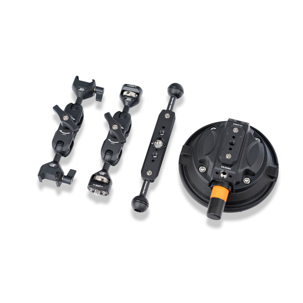 The Pro Combo components separated: two arms, extension arm and suction cup base