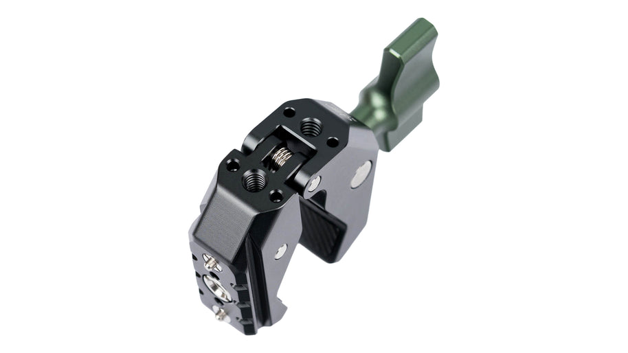 Camera super clamp viewed from the mounting face, showing the thread pattern and NATO rail